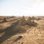 Aerial photography showcasing the striking Trona Pinnacles geological formations in a desert landscape.